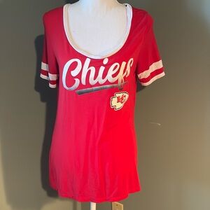 Kansas City Chiefs shirt.